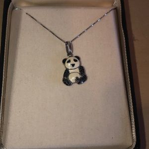 Black diamond panda pendent on a silver chain